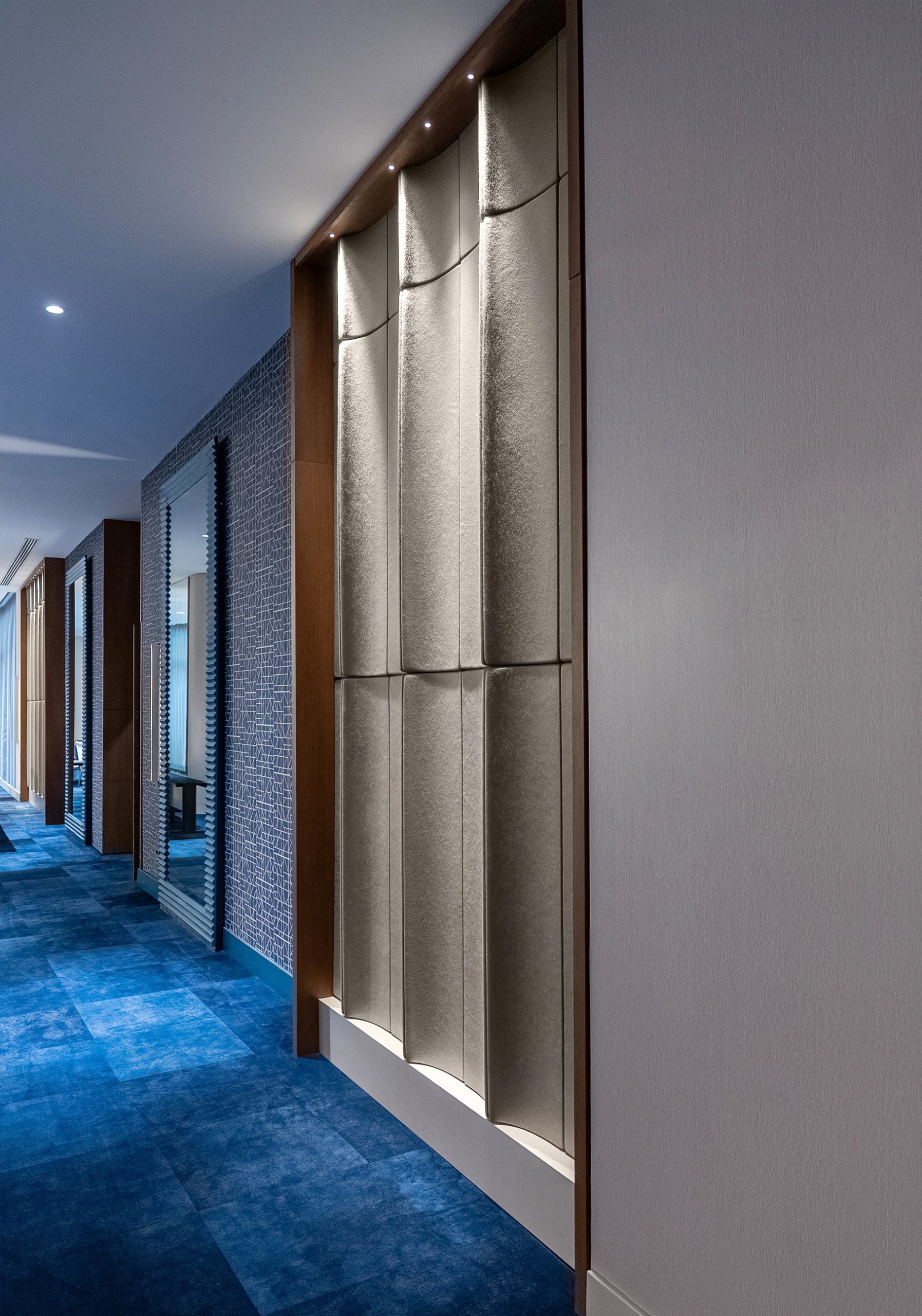Flux acoustic wall panels integrated into the Akra Hotel ballroom walls to reduce reverberation and improve speech clarity