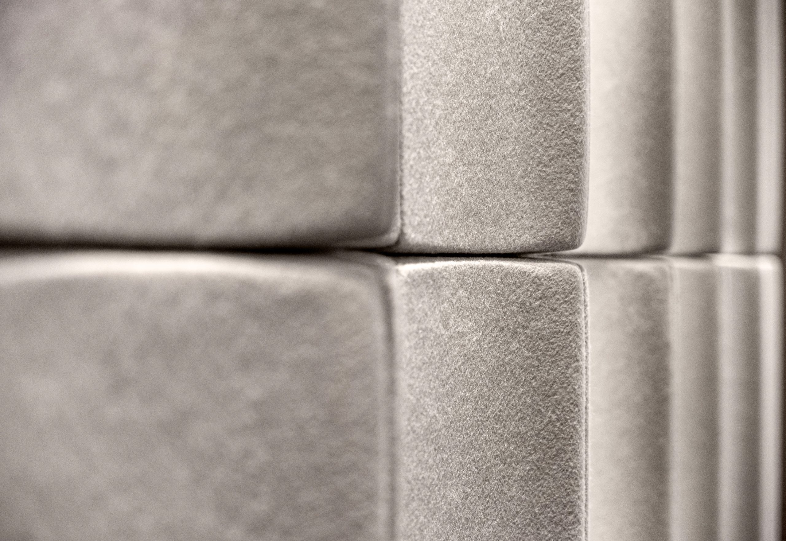 Detailed view of Flux acoustic wall panels in the Akra Hotel ballroom with textured PET felt surface