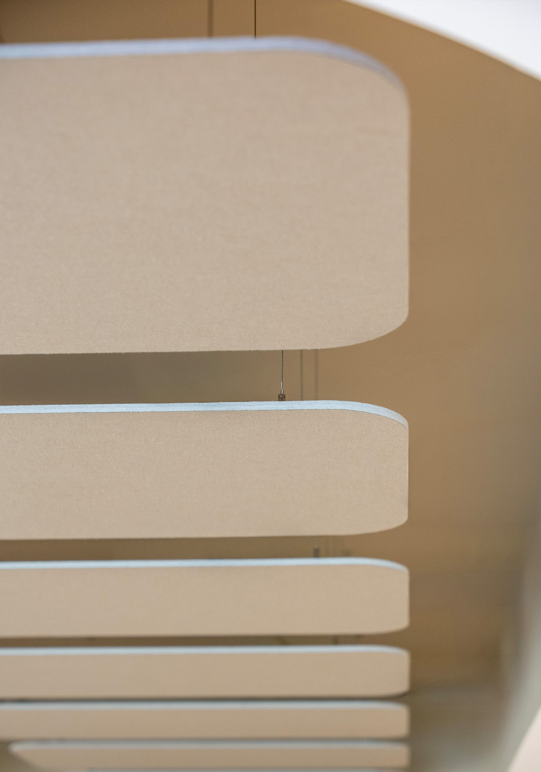 Flat Cloud acoustic ceiling panels suspended from a modern ceiling