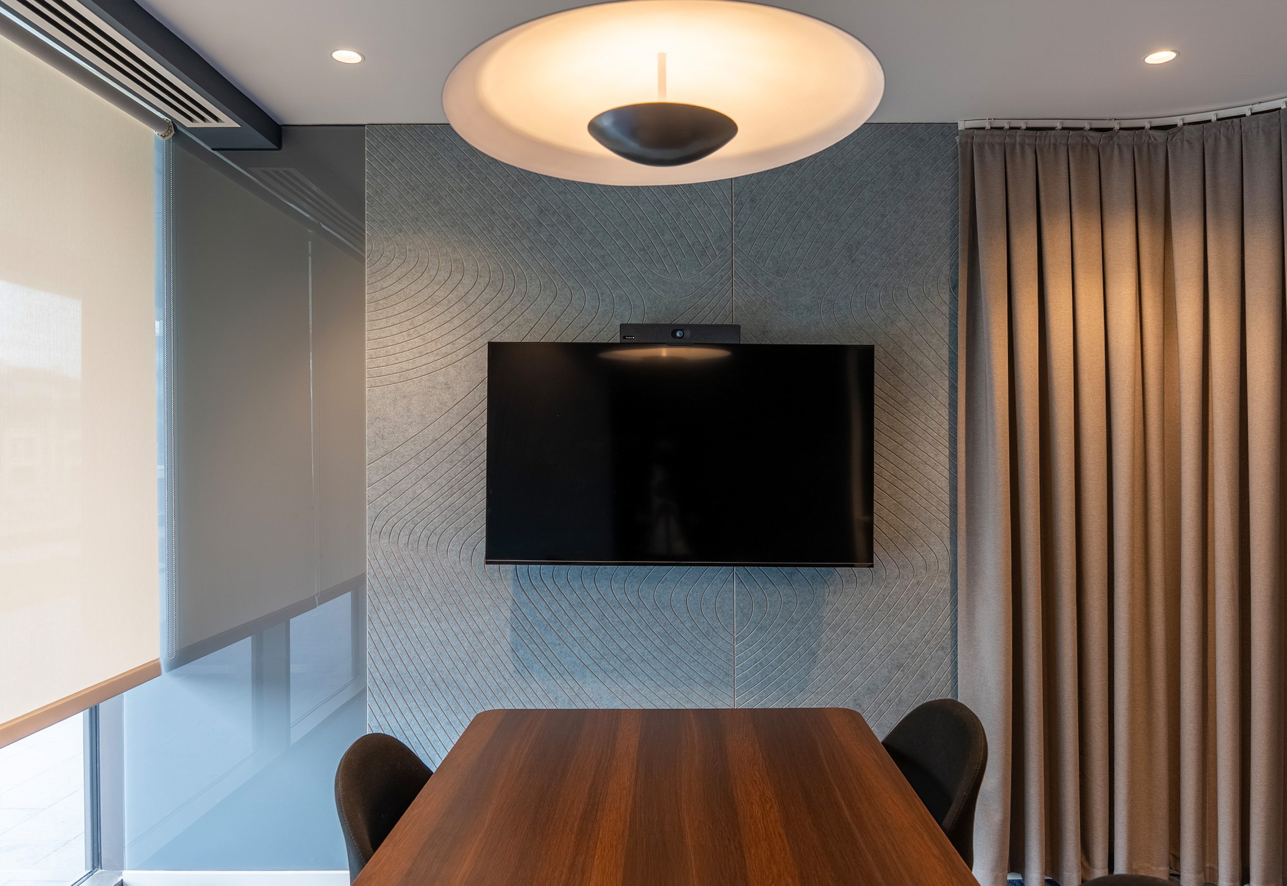 Tiles Zebra acoustic wall panels in a modern meeting room