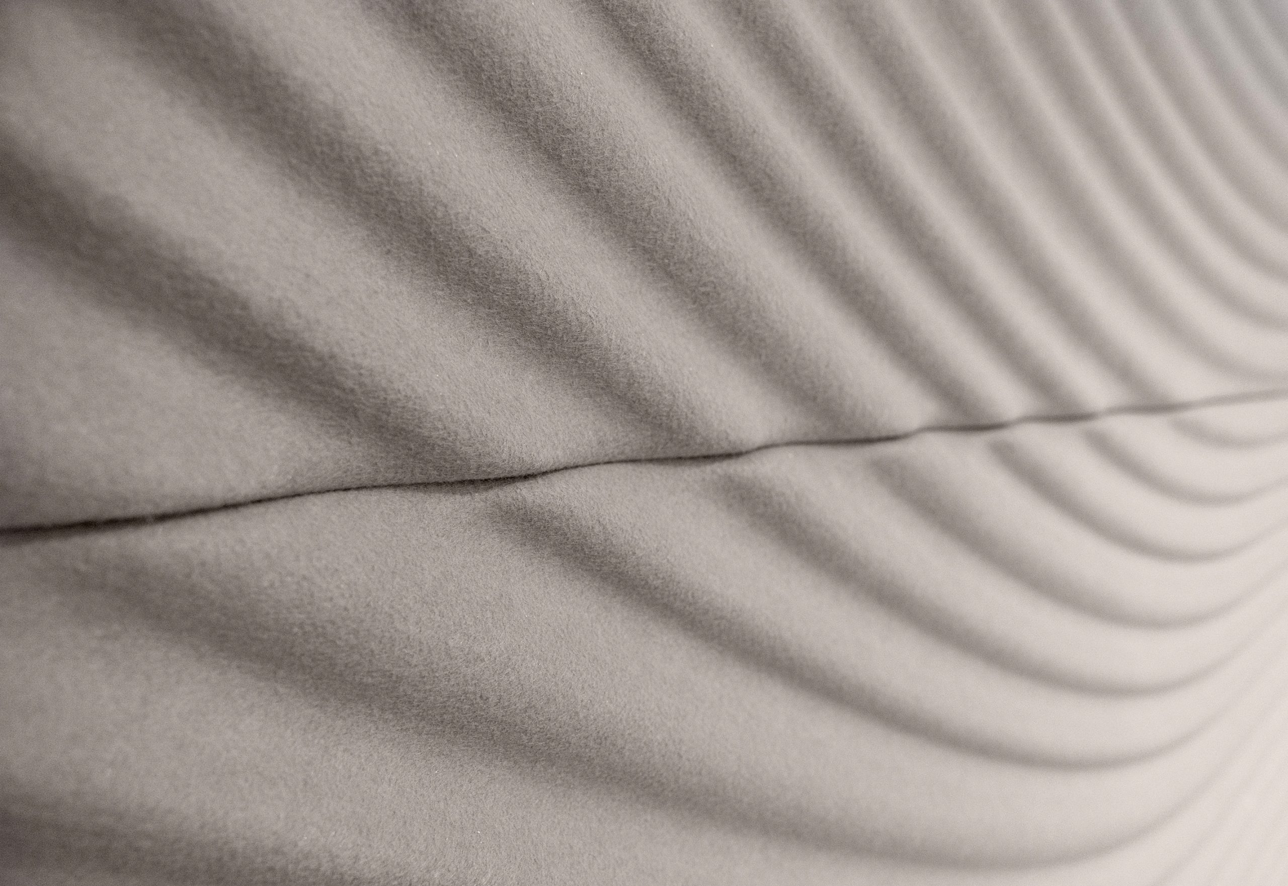 Zen acoustic wall panel with flowing geometric texture