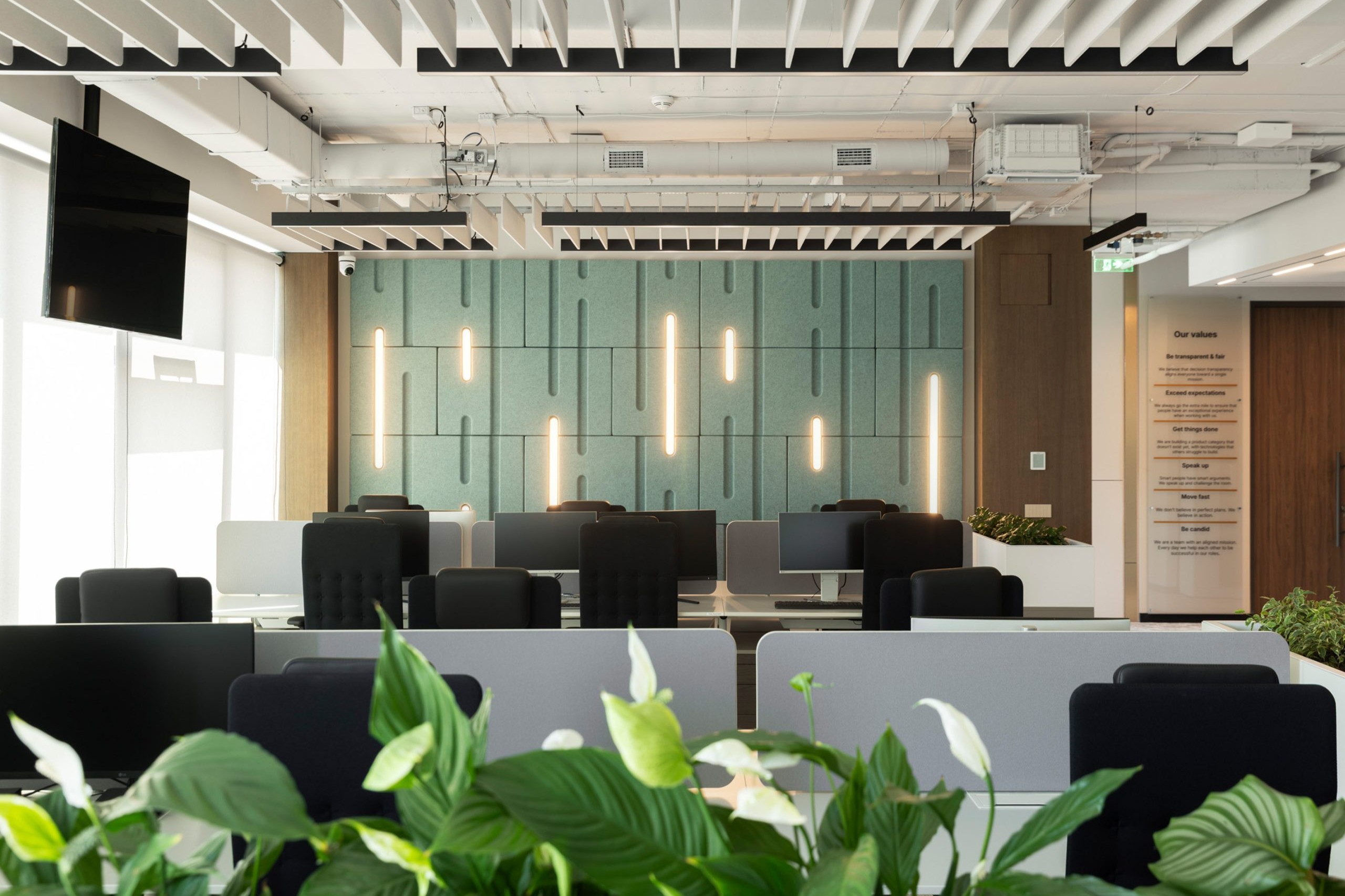 Feltouch Cloud Baffle Tiles and Raindrop acoustic lighting in a Leverage Shares office