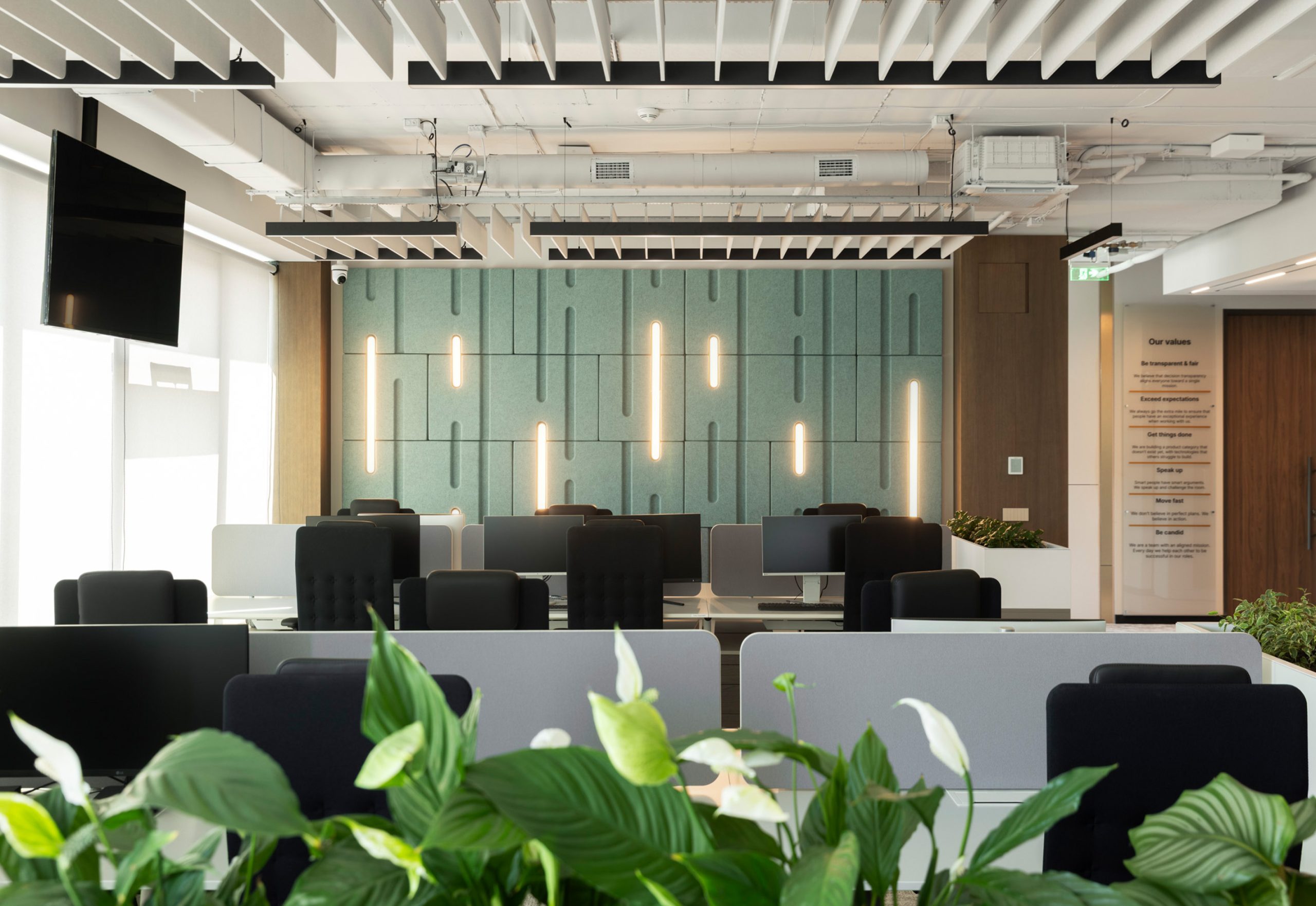 Feltouch Cloud Baffle Tiles and Raindrop acoustic lighting in a Leverage Shares office
