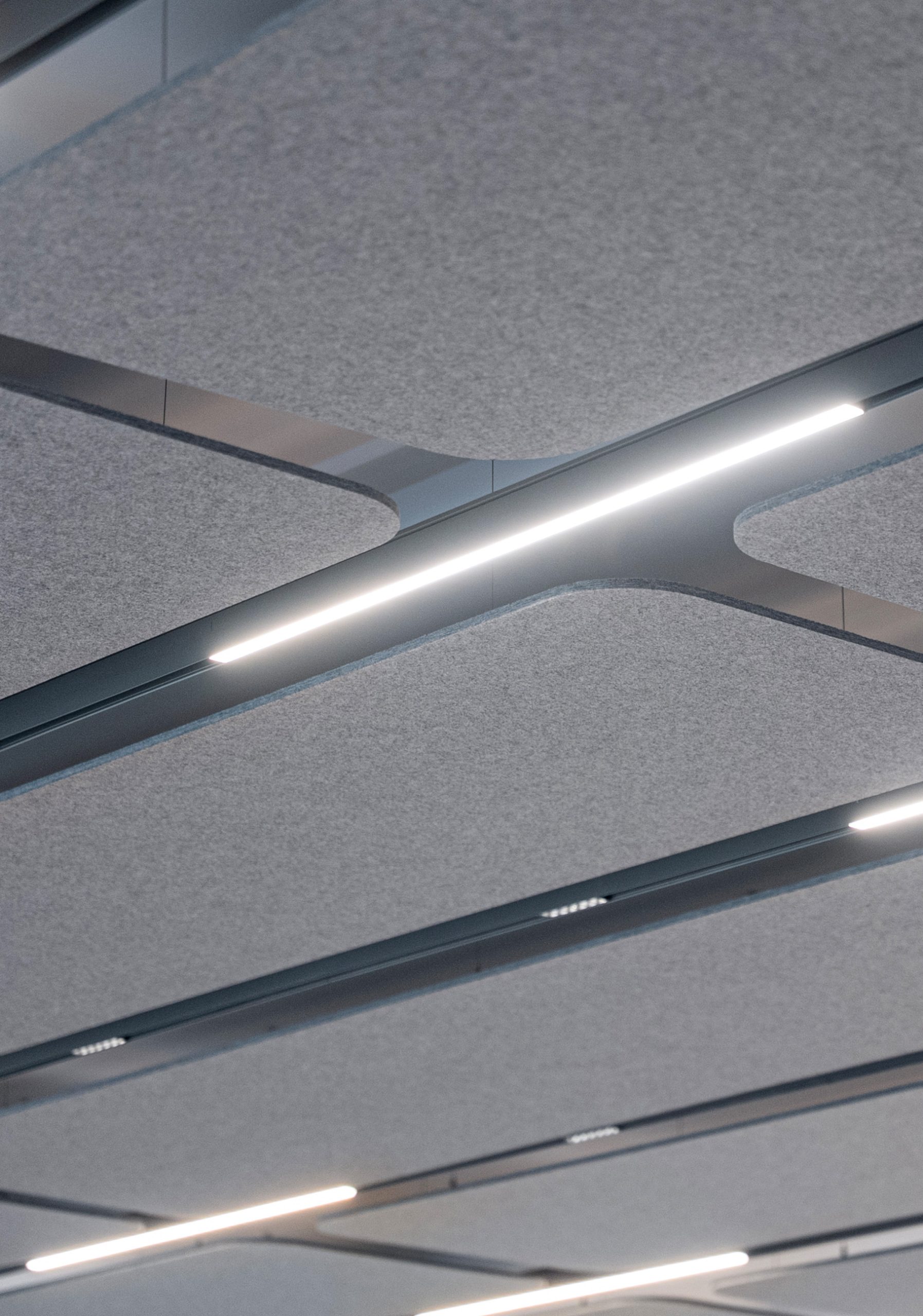 Flat Cloud acoustic ceiling panels above meeting tables at Nobel